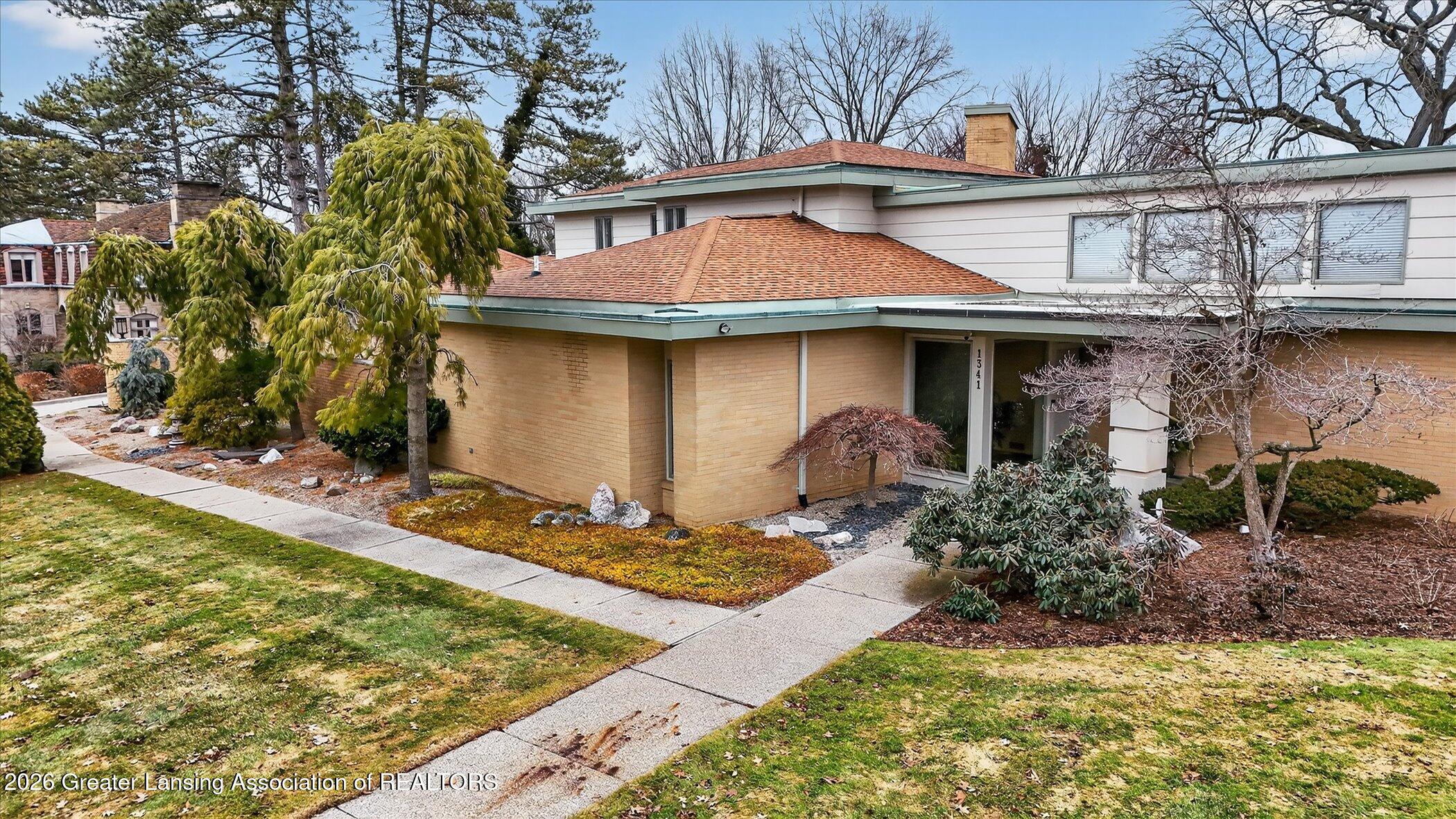 1341 Cambridge Road Lansing, MI 48911 - Photo 2 of 62 55-1341-Cambridge-Rd-Lansing-MI-48911-Wi