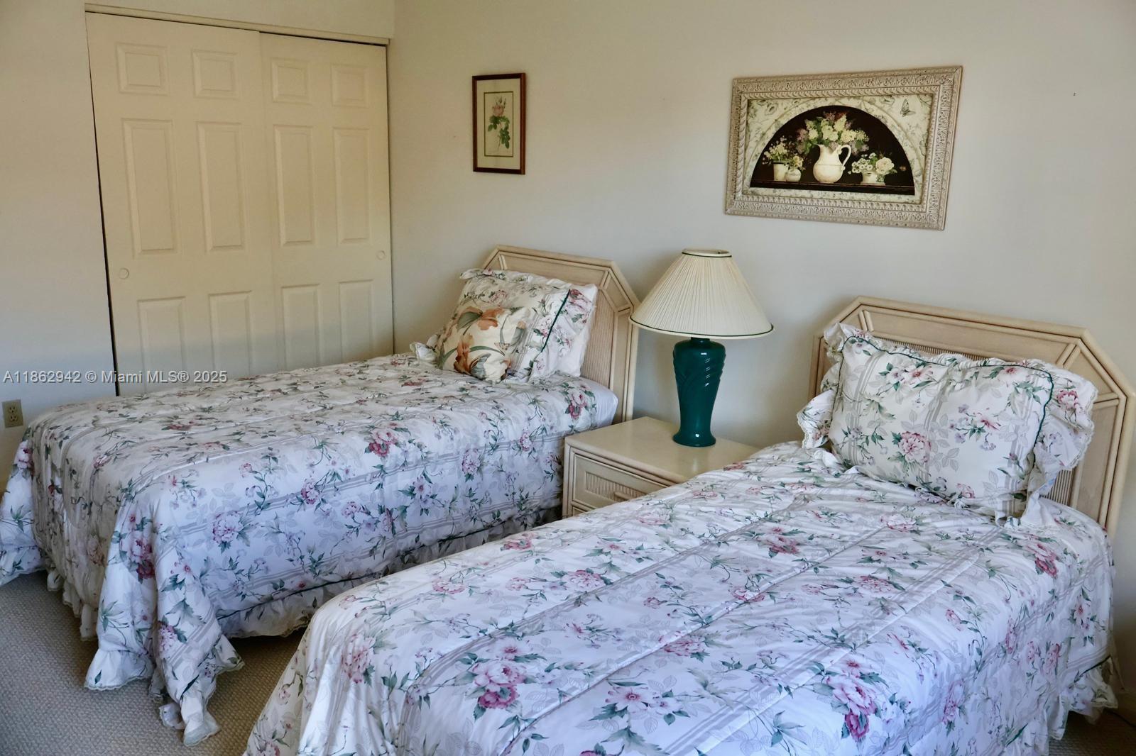 17246 Boca Club Boulevard, Unit 102 Boca Raton, FL 33487 - Photo 34 of 50 a bedroom with double bed and a window