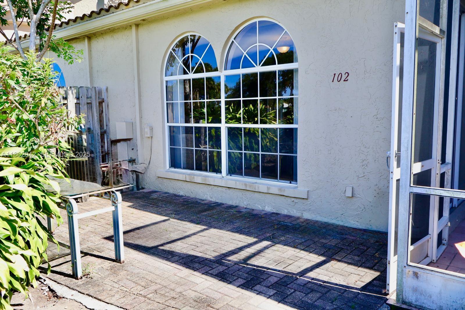 17246 Boca Club Boulevard, Unit 102 Boca Raton, FL 33487 - Photo 42 of 50 a view of entryway with wooden floor