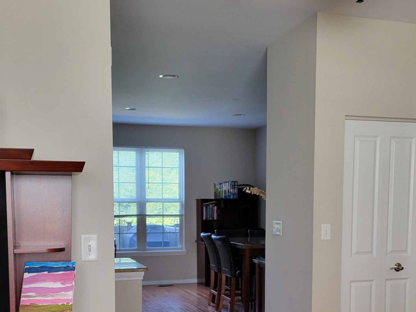 2475 Waterbury Lane Buffalo Grove, IL 60089 - Photo 7 of 19 a view of a workspace with furniture and a window