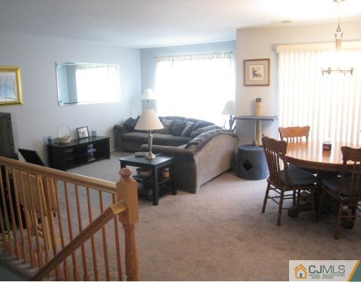 1419 Plymouth Road North Brunswick, NJ 08902 - Photo 4 of 9 a living room with furniture and a window