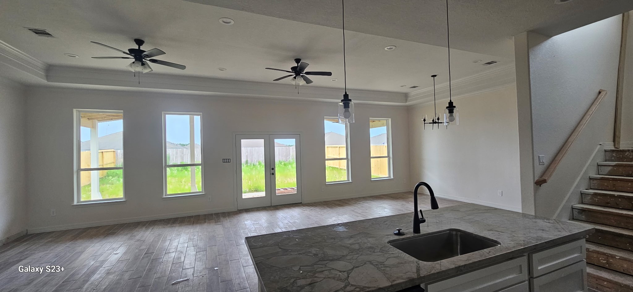134 Peachleaf Court Anahuac, TX 77514 - Photo 7 of 7 a view of an entryway with a chandelier