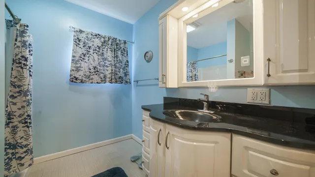 a room with furniture and gym equipment