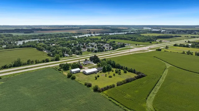 a view of a livingroom with furniture and a flat screen tv