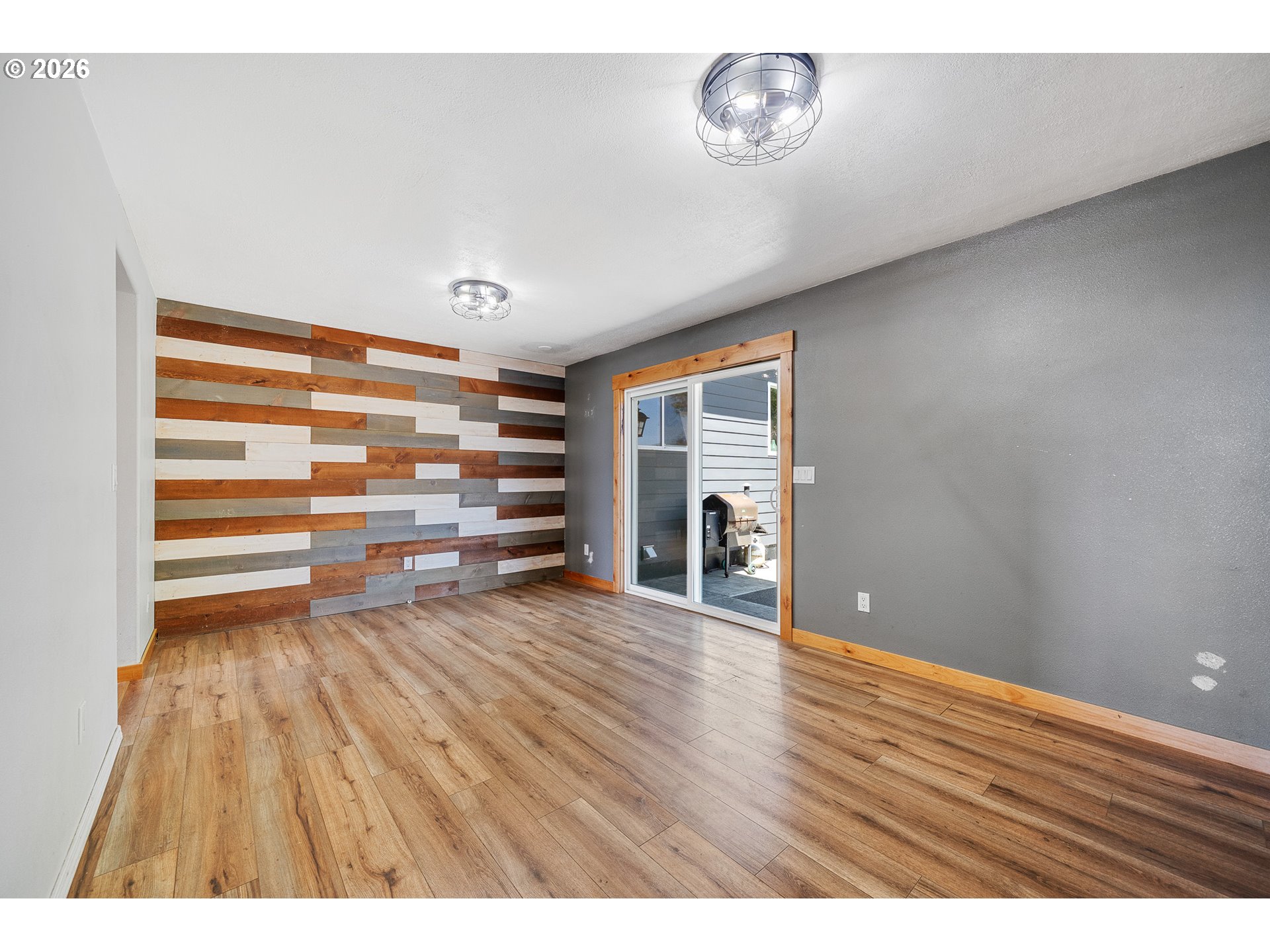 850 Hodgdon Road Tillamook, OR 97141 - Photo 9 of 43 a view of room with wooden floor