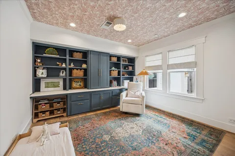 a spacious bathroom with a sink a vanity and a mirror
