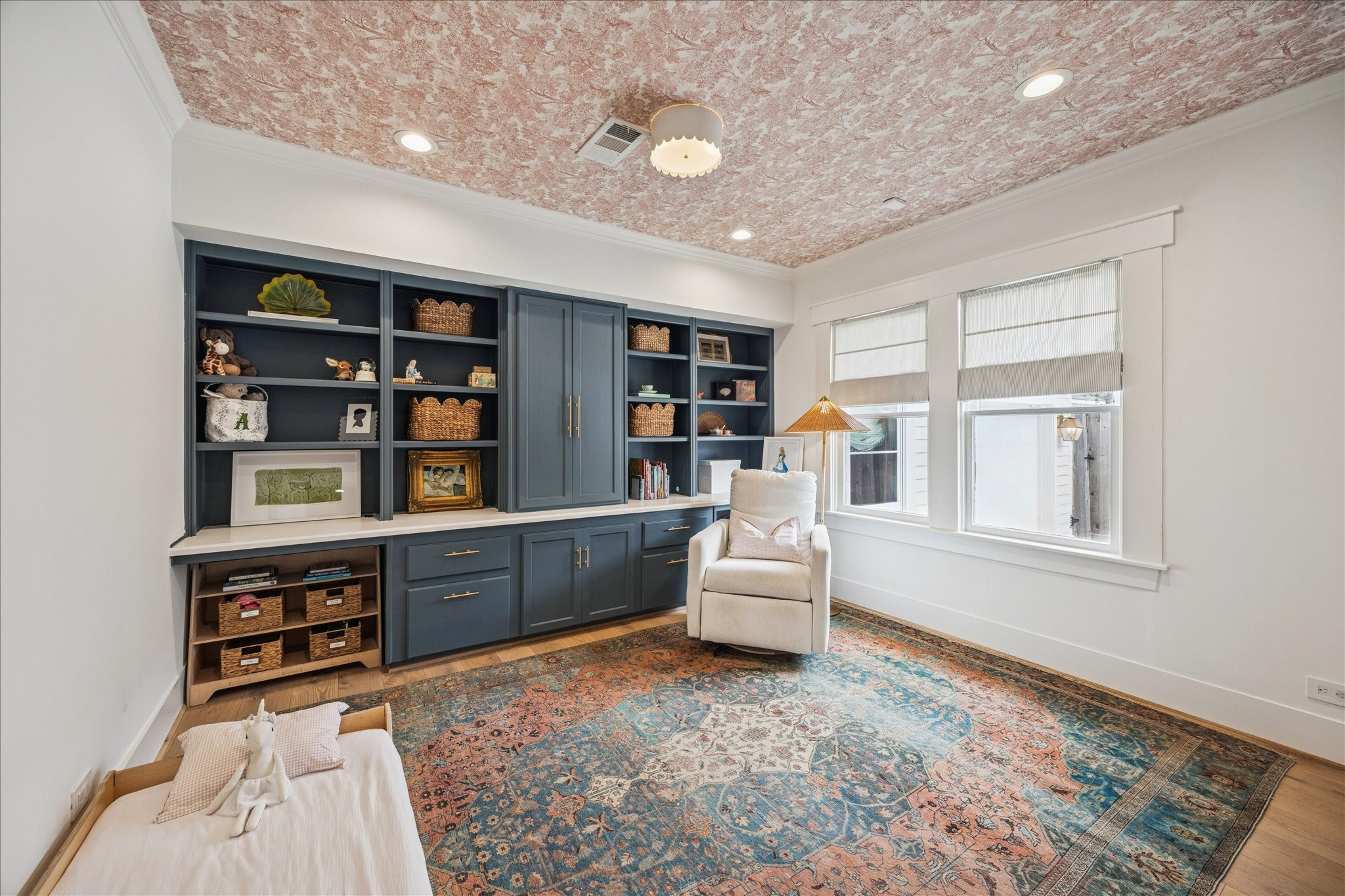 823 Sledge Street Houston, TX 77009 - Photo 16 of 24 a living room with furniture and book shelf