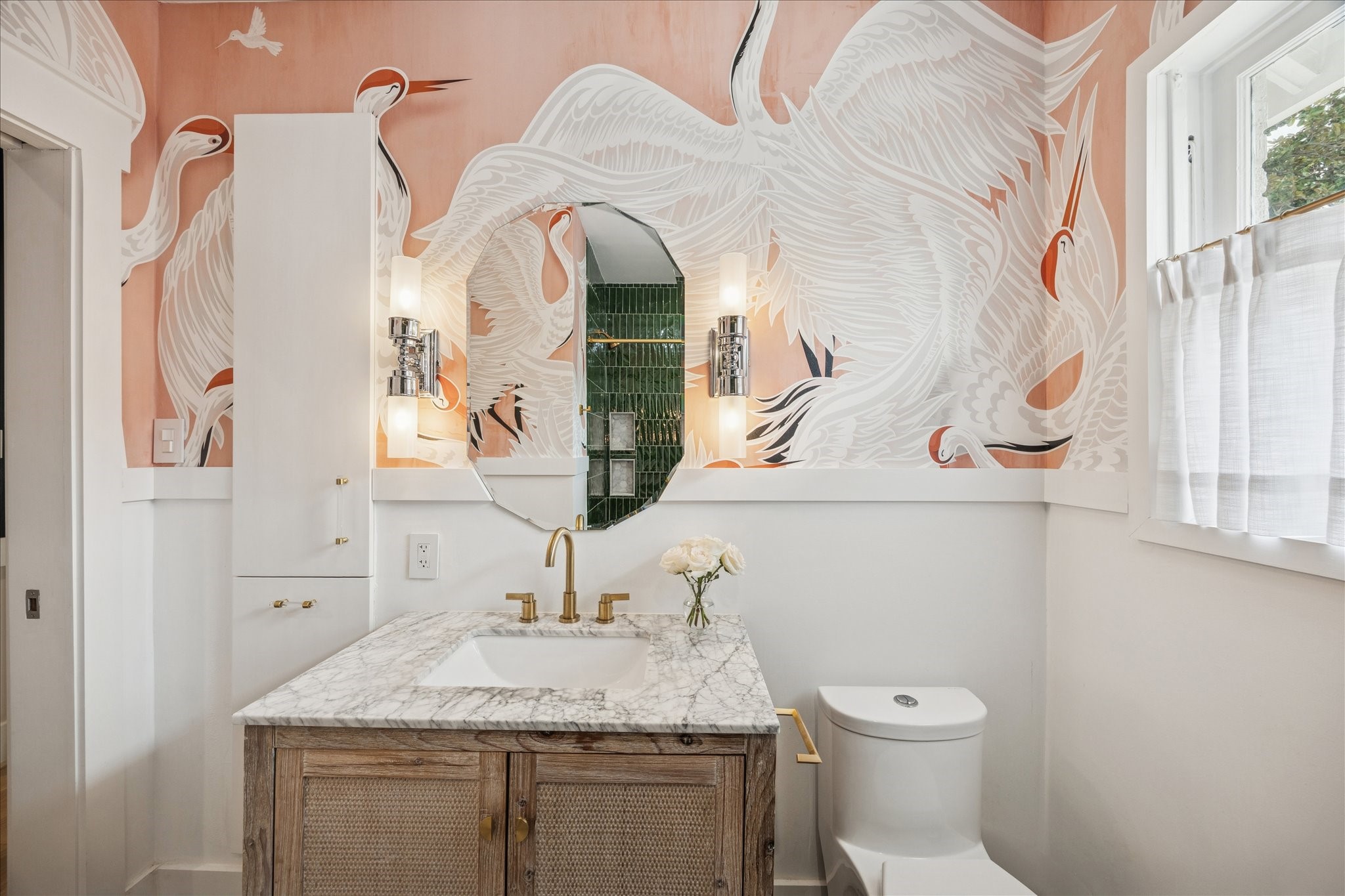 823 Sledge Street Houston, TX 77009 - Photo 18 of 24 a bathroom with a granite countertop sink and a mirror