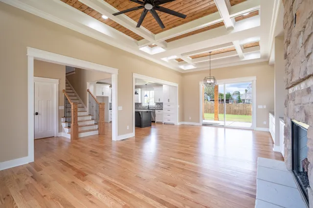 a view of balcony with a floor to ceiling window and wooden floor