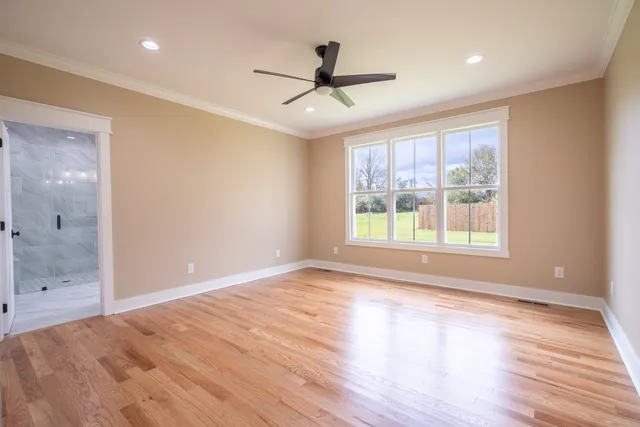 a bathroom with a double vanity sink and mirror