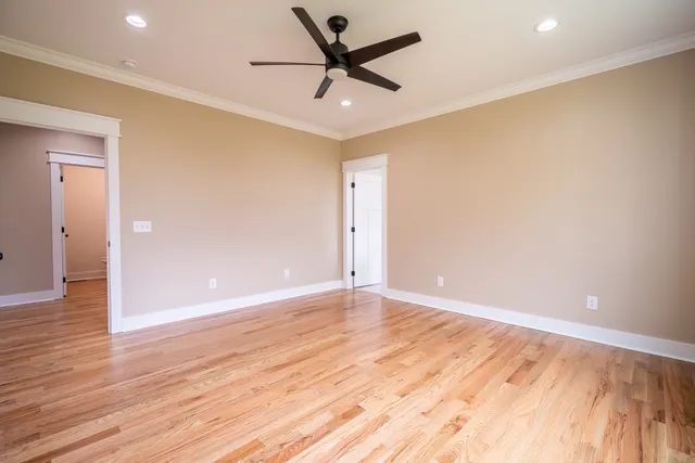 a bathroom with a shower and a toilet