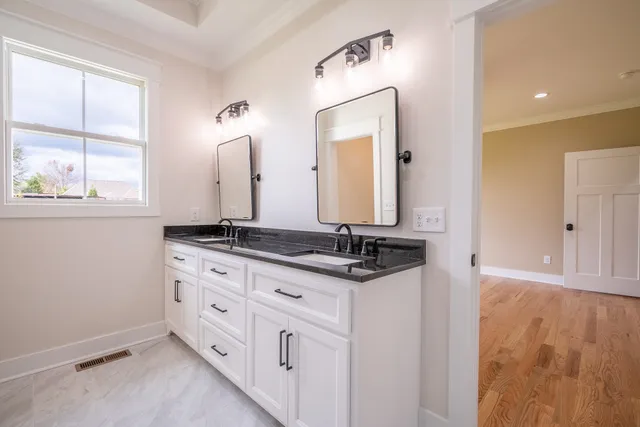 a view of kitchen with wooden floor
