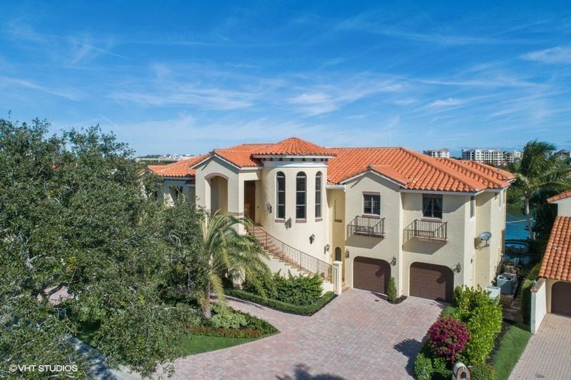 16904 Passage South Jupiter, FL 33477 - Photo 18 of 22 a front view of a house with a yard