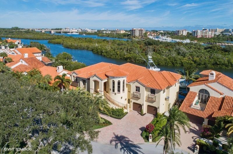 16904 Passage South Jupiter, FL 33477 - Photo 19 of 22 an aerial view of residential houses with outdoor space and river