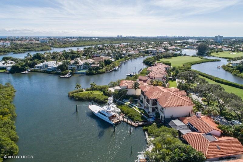 16904 Passage South Jupiter, FL 33477 - Photo 20 of 22 an aerial view of lake residential house with outdoor space