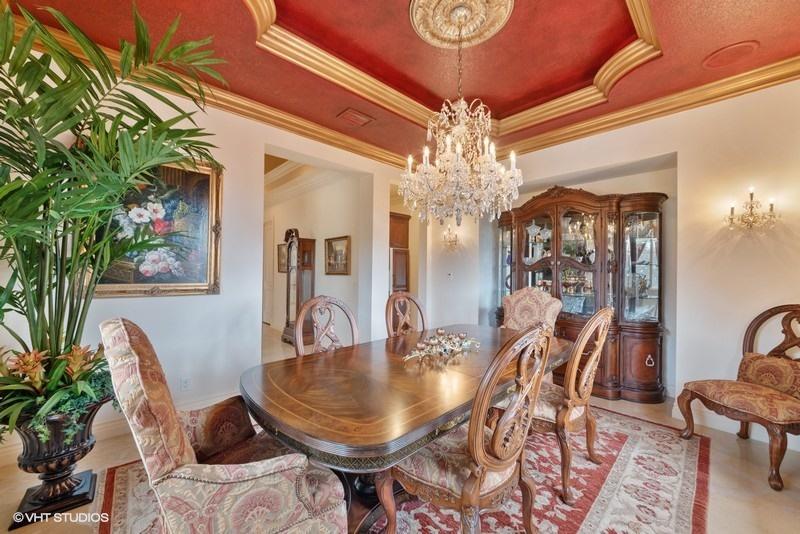16904 Passage South Jupiter, FL 33477 - Photo 10 of 22 a view of a dining room with furniture and chandelier
