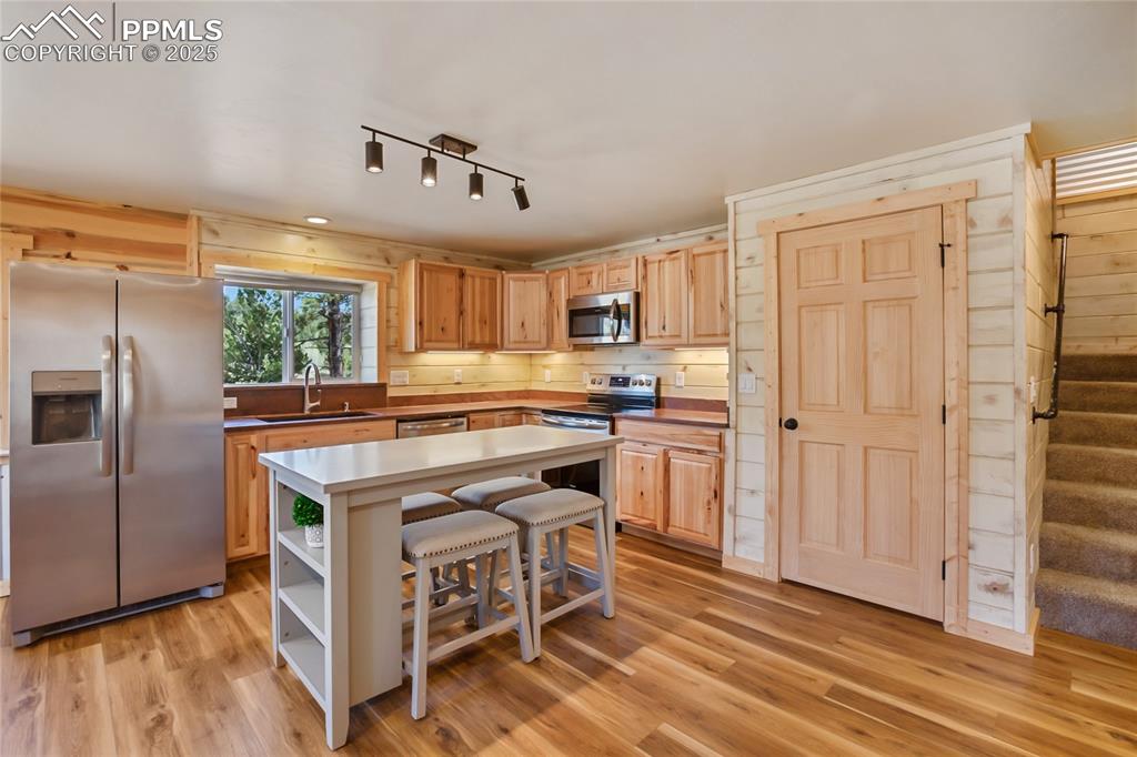 621 Yorktown Road Cripple Creek, CO 80813 - Photo 11 of 29 Kitchen has beautiful hickory cabinet's and pantry