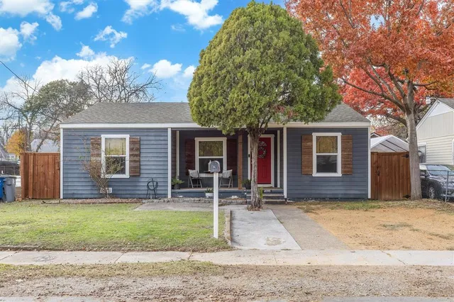 front view of a house with a yard