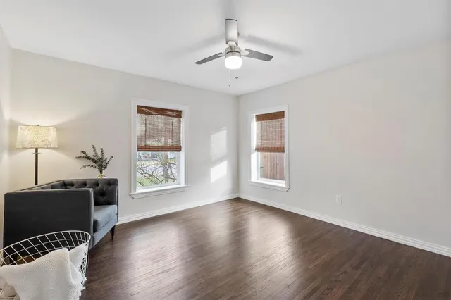 a view of livingroom with furniture wooden floor and a window