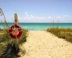 8855 Collins Avenue, Unit 9E Surfside, FL 33154 - Photo 5 of 9 a view of a lake