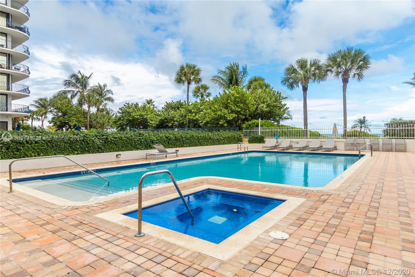 8855 Collins Avenue, Unit 9E Surfside, FL 33154 - Photo 8 of 9 swimming pool view with a outdoor seating space