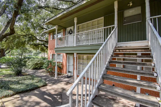 a view of entryway with wooden stairs