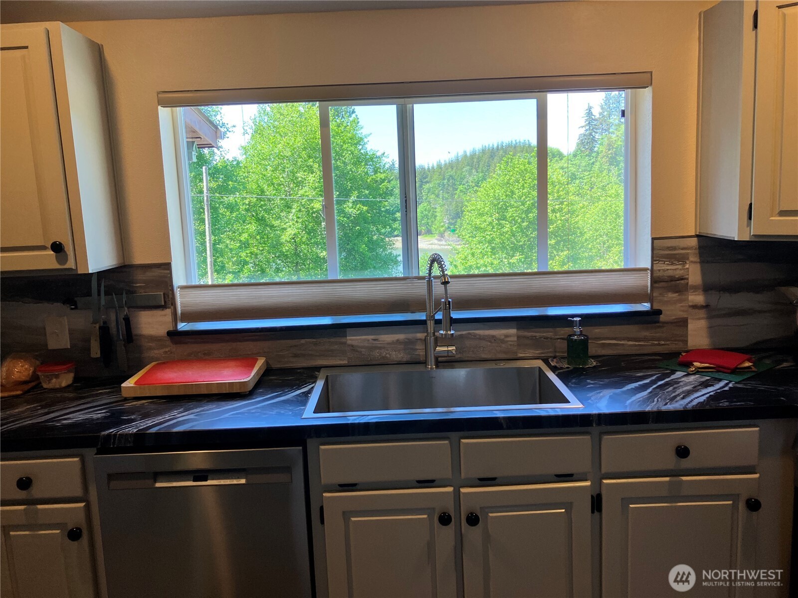 1171 Ray Hicks Street Raymond, WA 98577 - Photo 13 of 33 a kitchen sink with a window