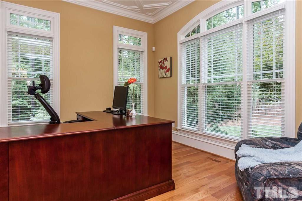 5515 Strathmore Drive Raleigh, NC 27613 - Photo 3 of 25 a living room with furniture and a window