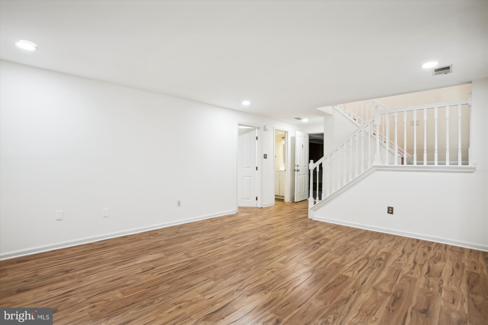 7660 Fallswood Way Lorton, VA 22079 - Photo 13 of 20 New Flooring in basement