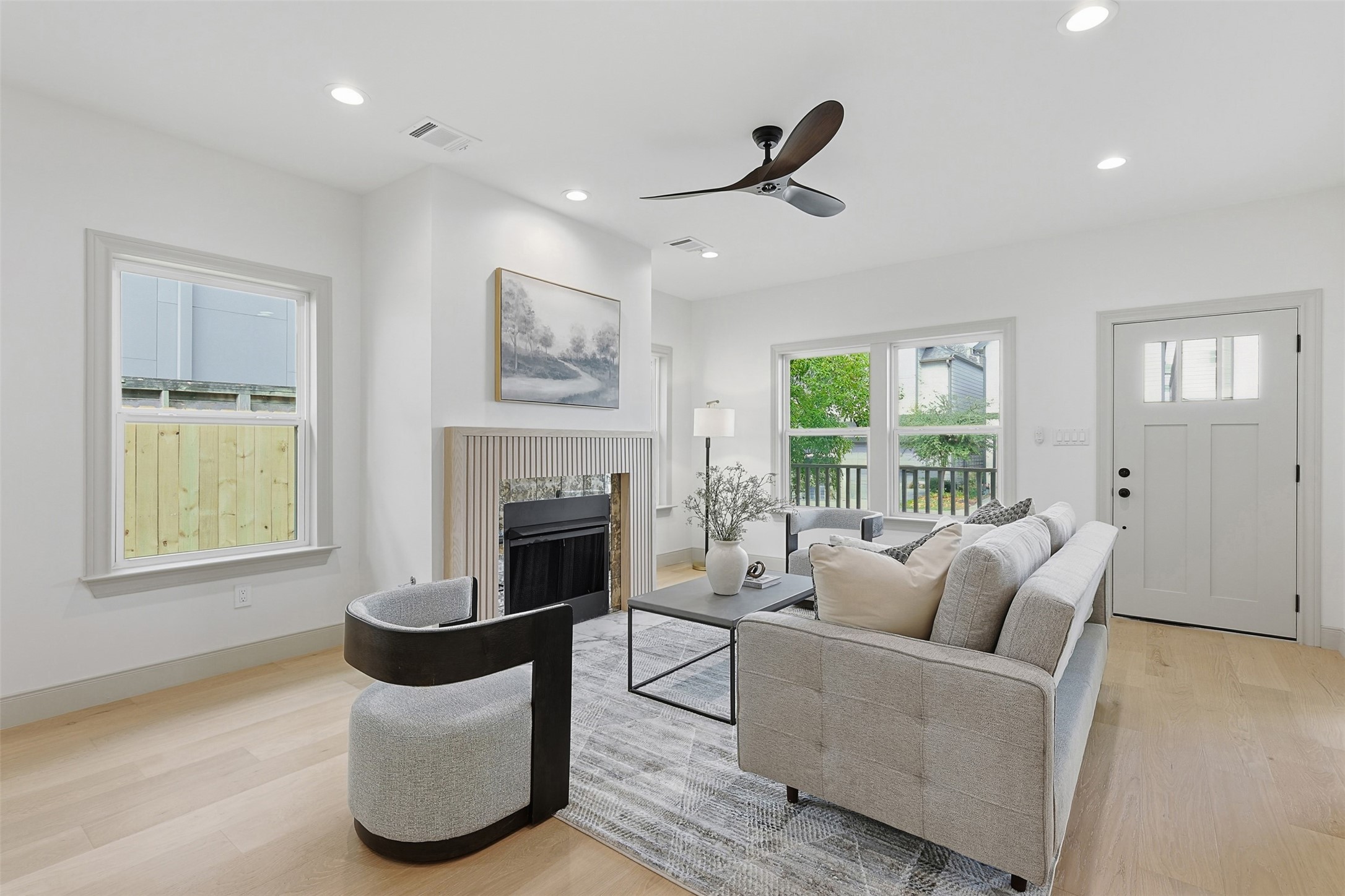1202 Aurora Street Houston, TX 77009 - Photo 11 of 37 a living room with furniture and a fireplace