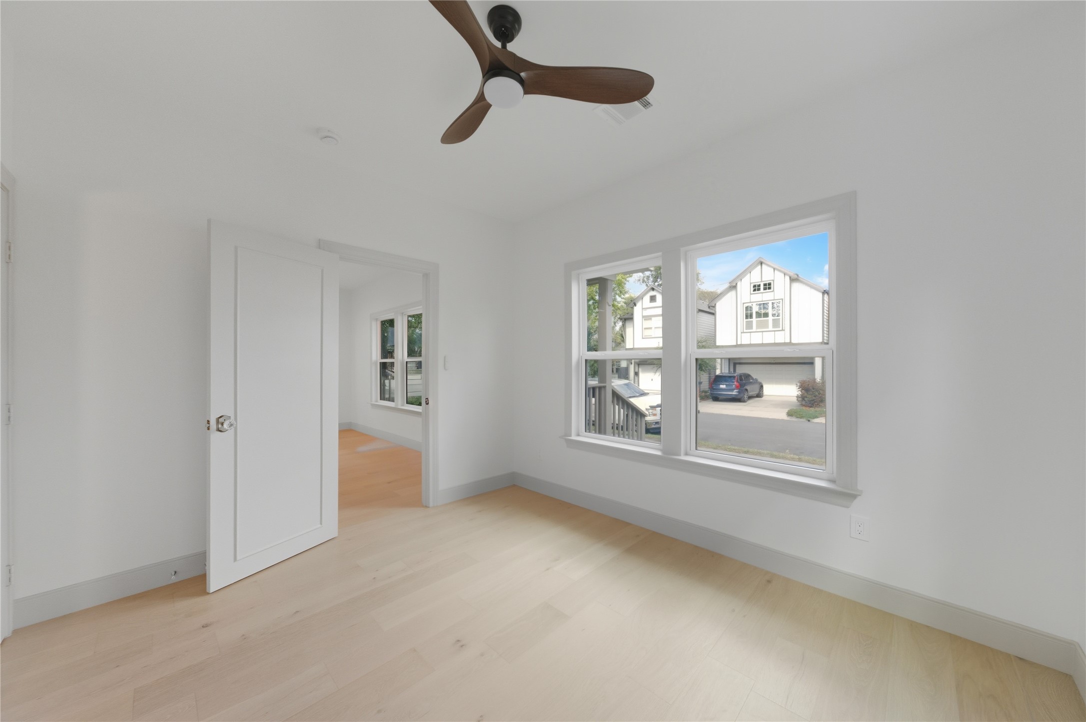 1202 Aurora Street Houston, TX 77009 - Photo 16 of 37 a view of an empty room with a window