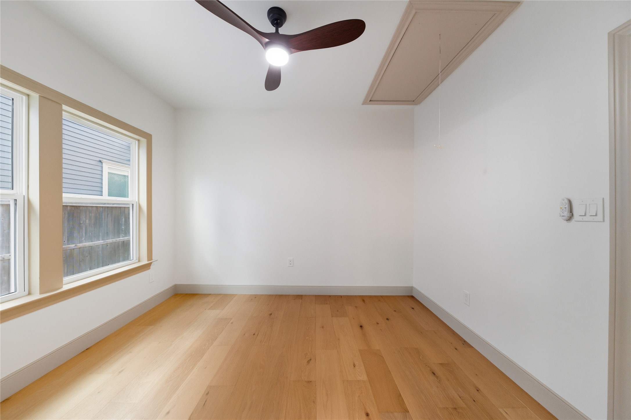 1202 Aurora Street Houston, TX 77009 - Photo 19 of 37 an empty room with a window