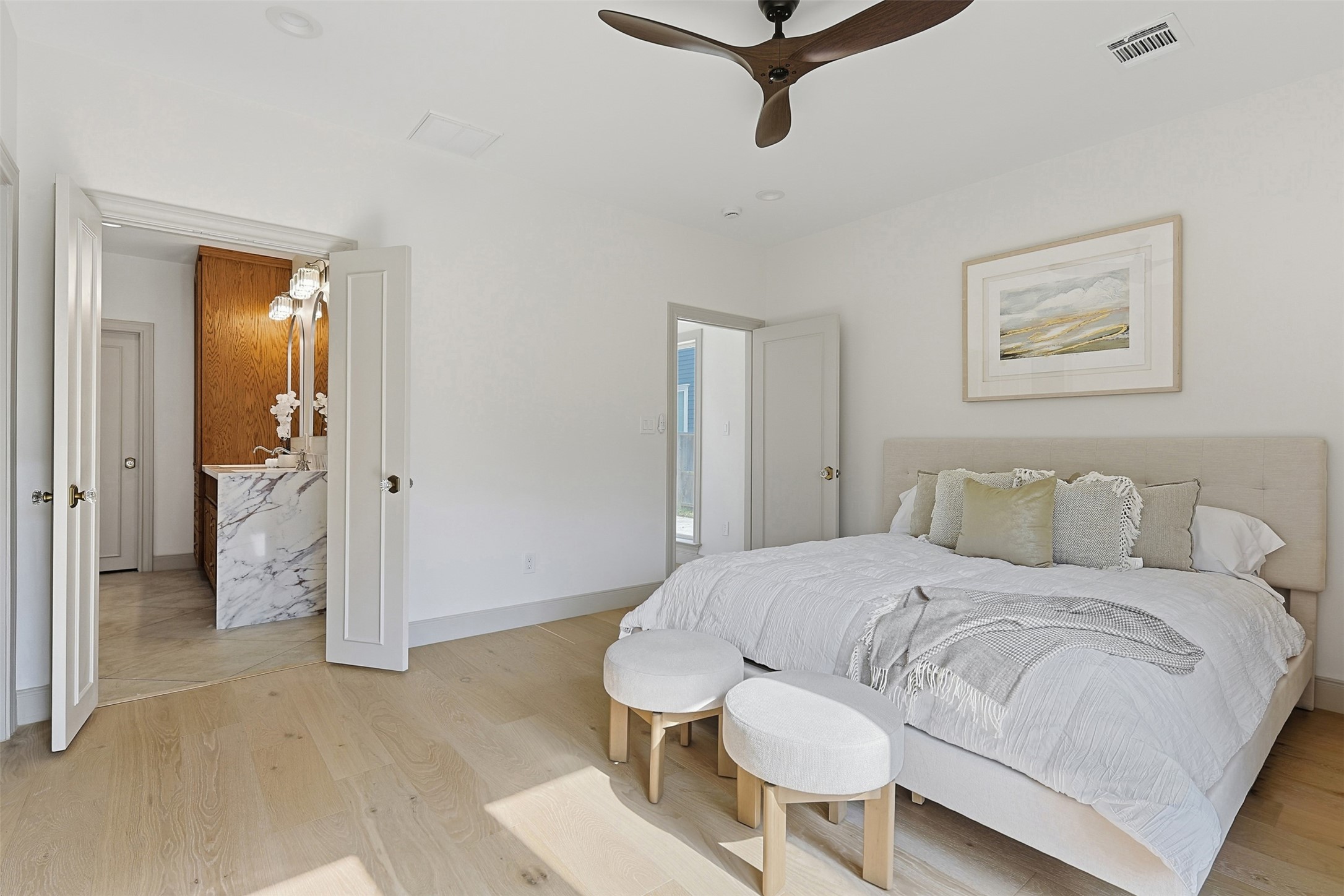 1202 Aurora Street Houston, TX 77009 - Photo 27 of 37 a bedroom with a bed and bathroom