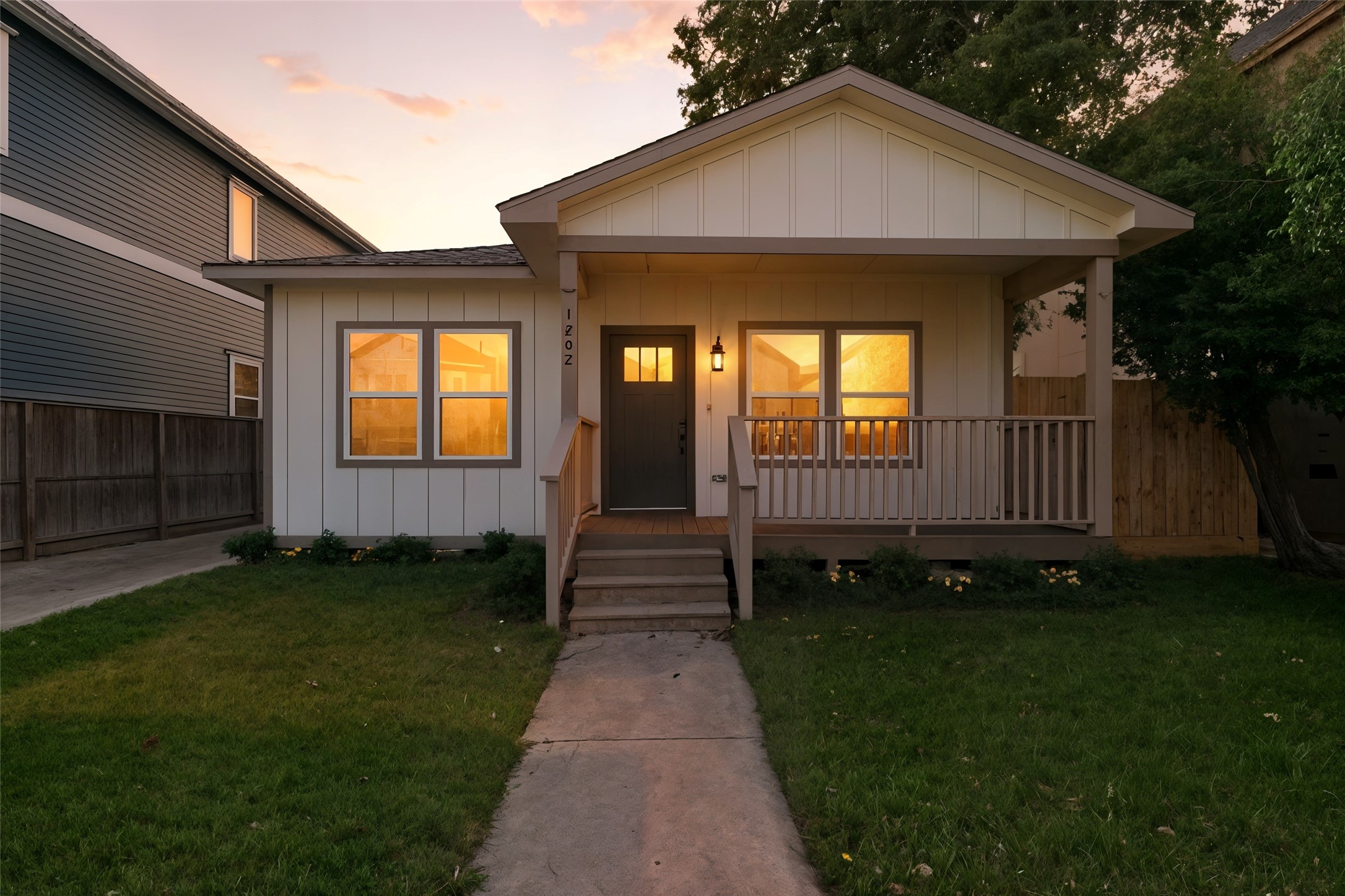 1202 Aurora Street Houston, TX 77009 - Photo 3 of 37 a front view of a house with garden
