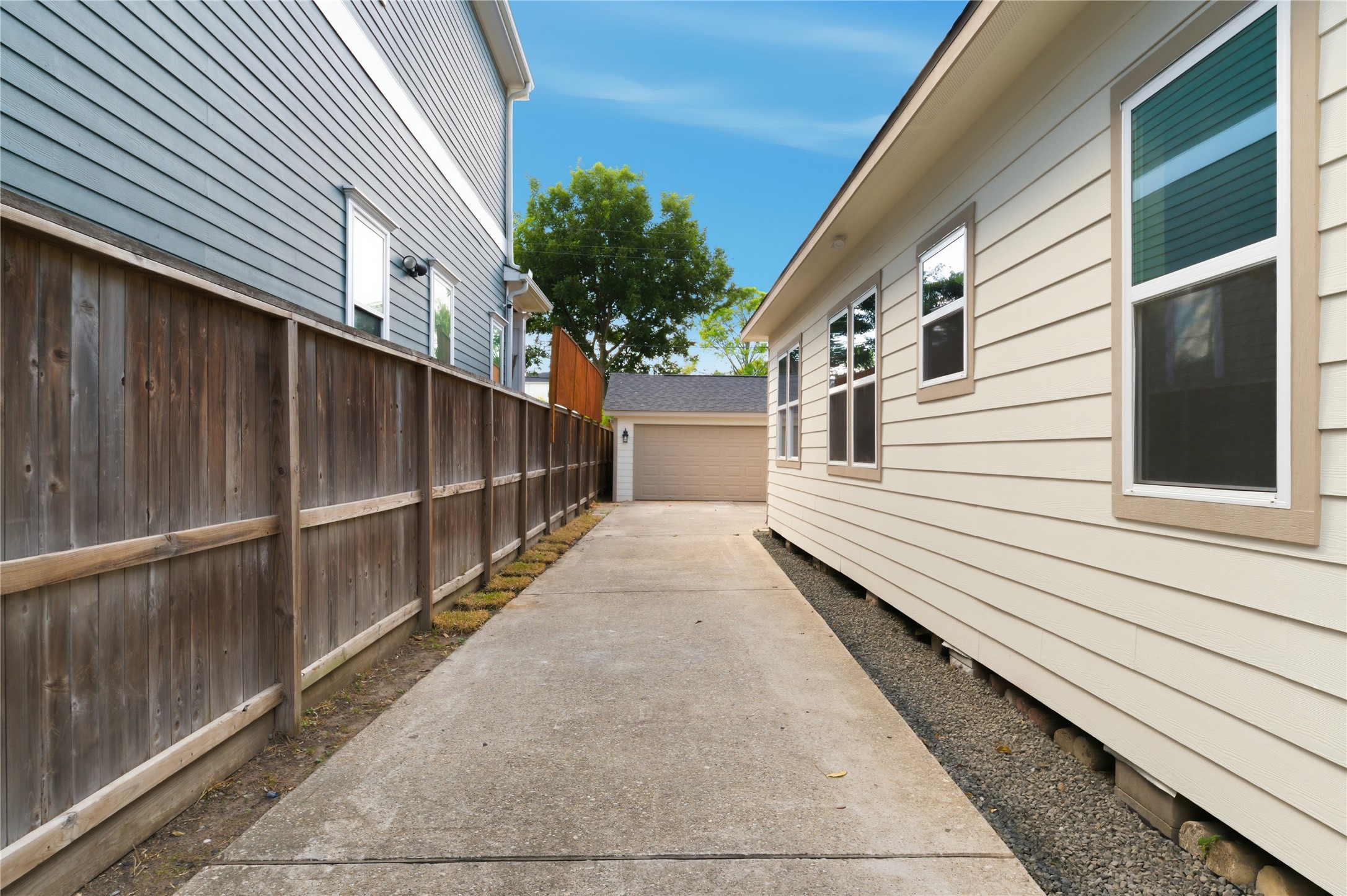 1202 Aurora Street Houston, TX 77009 - Photo 36 of 37 a view of a balcony with wooden floor and fence