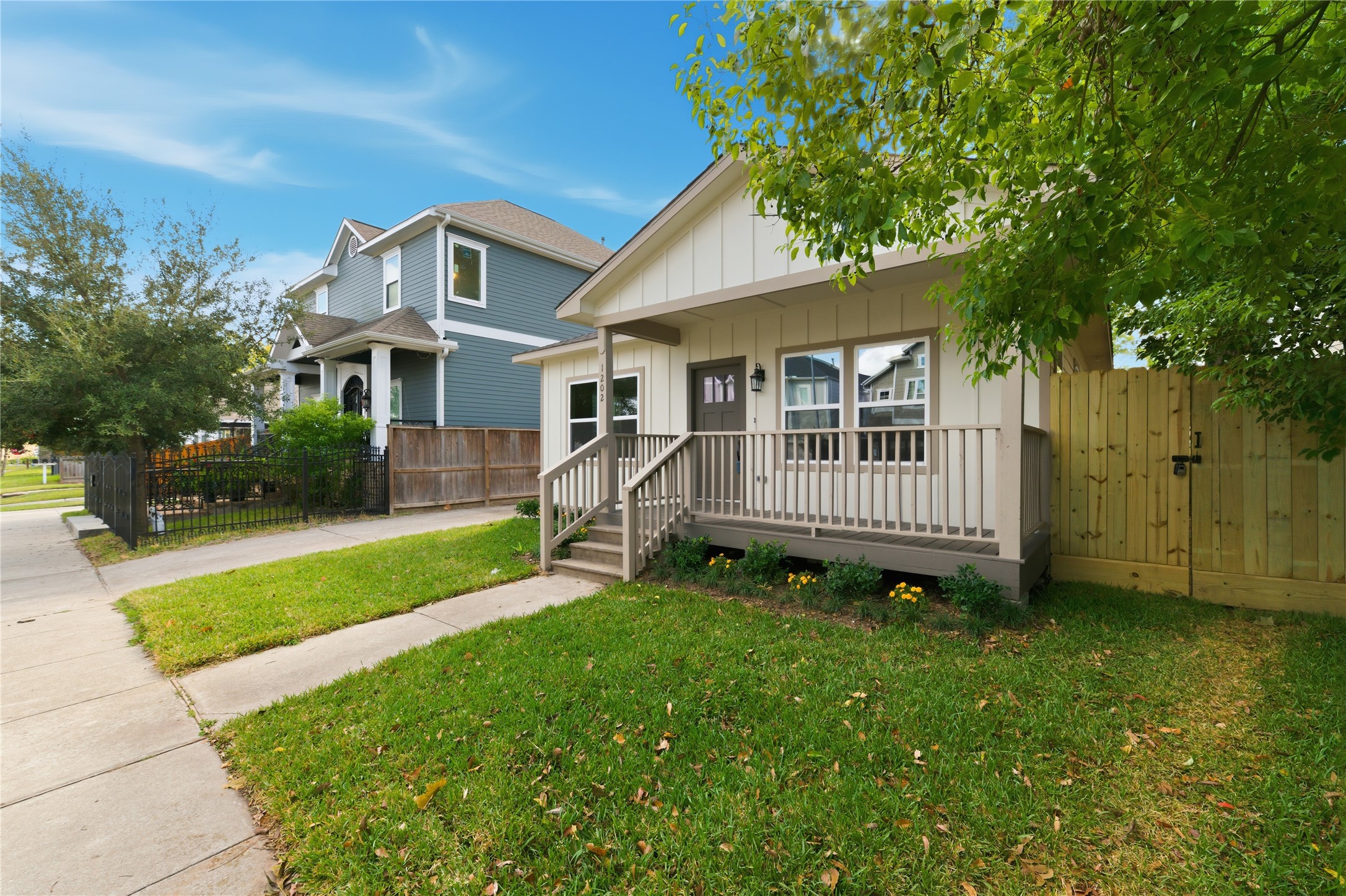 1202 Aurora Street Houston, TX 77009 - Photo 5 of 37 a view of a house with a yard and deck