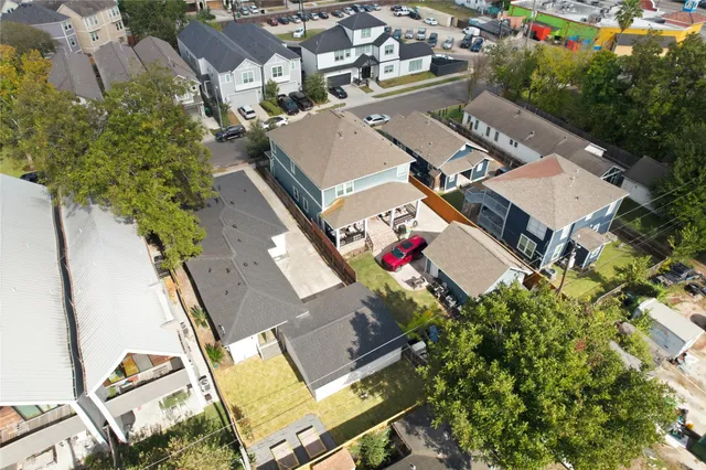 an aerial view of residential house with an outdoor space