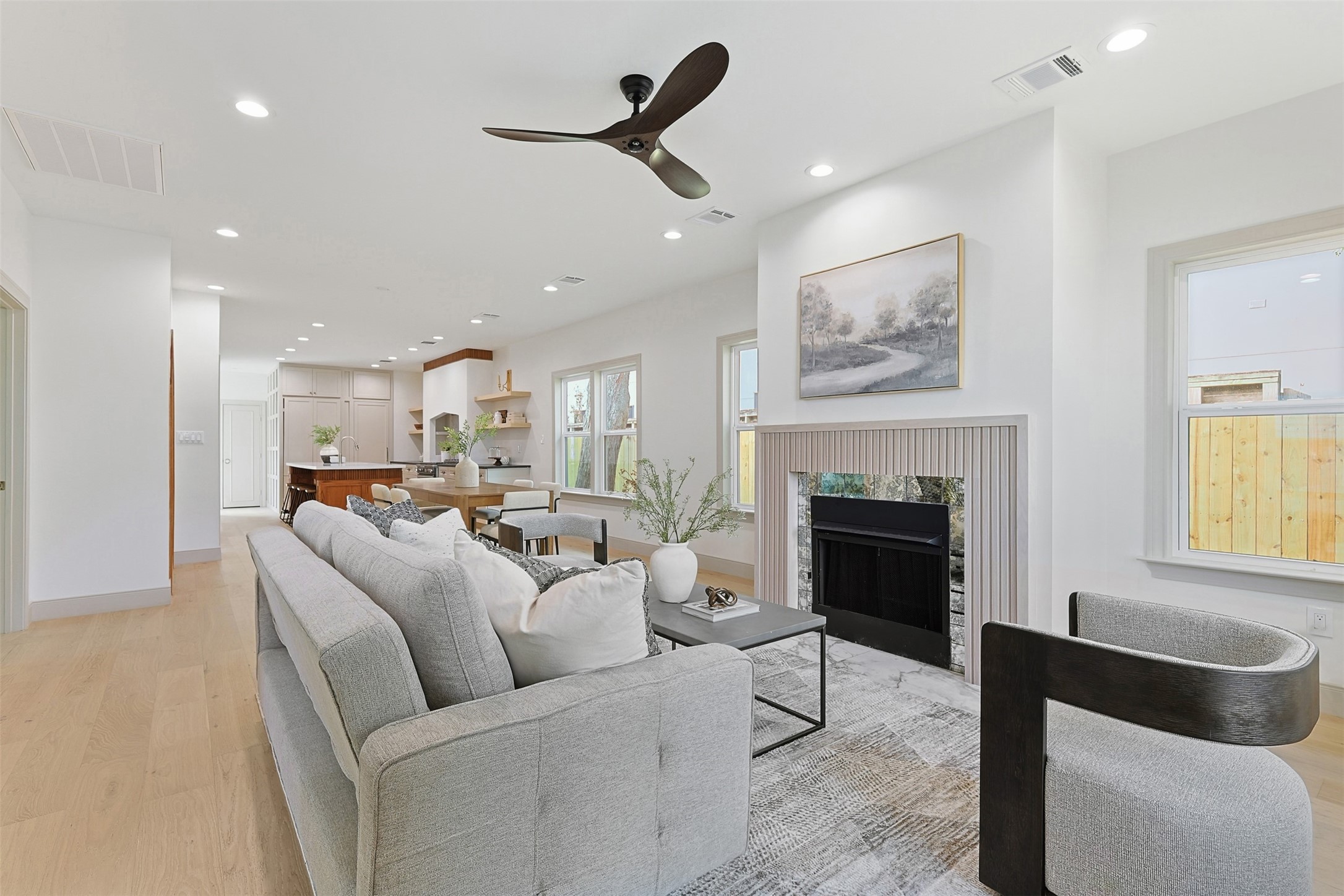 1202 Aurora Street Houston, TX 77009 - Photo 8 of 37 a living room with furniture and a fireplace