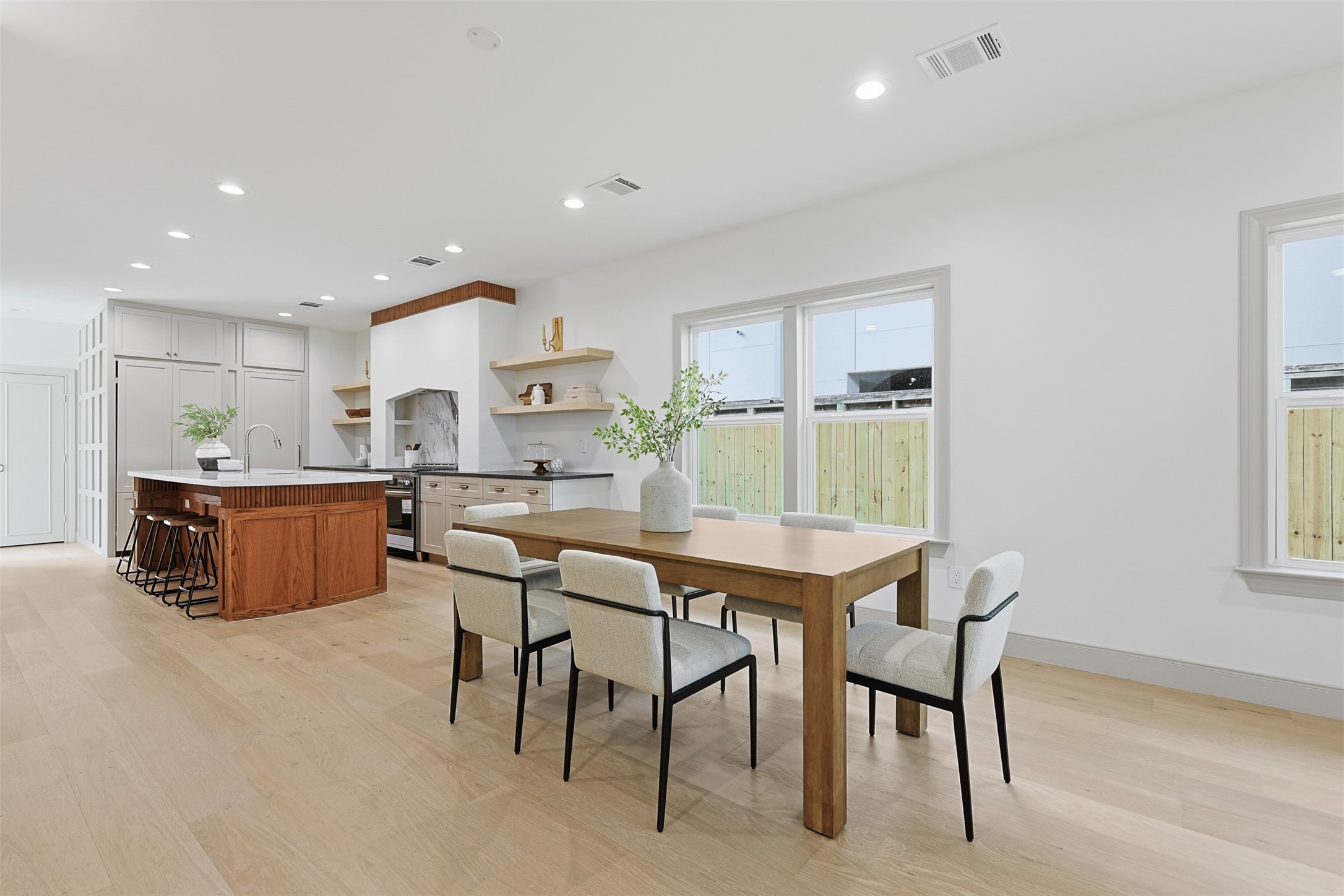 1202 Aurora Street Houston, TX 77009 - Photo 10 of 37 a kitchen with a table and chairs in it
