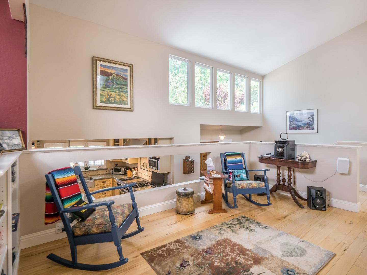 12445 Alba Road Ben Lomond, CA 95005 - Photo 11 of 37 a living room with furniture a rug and a window