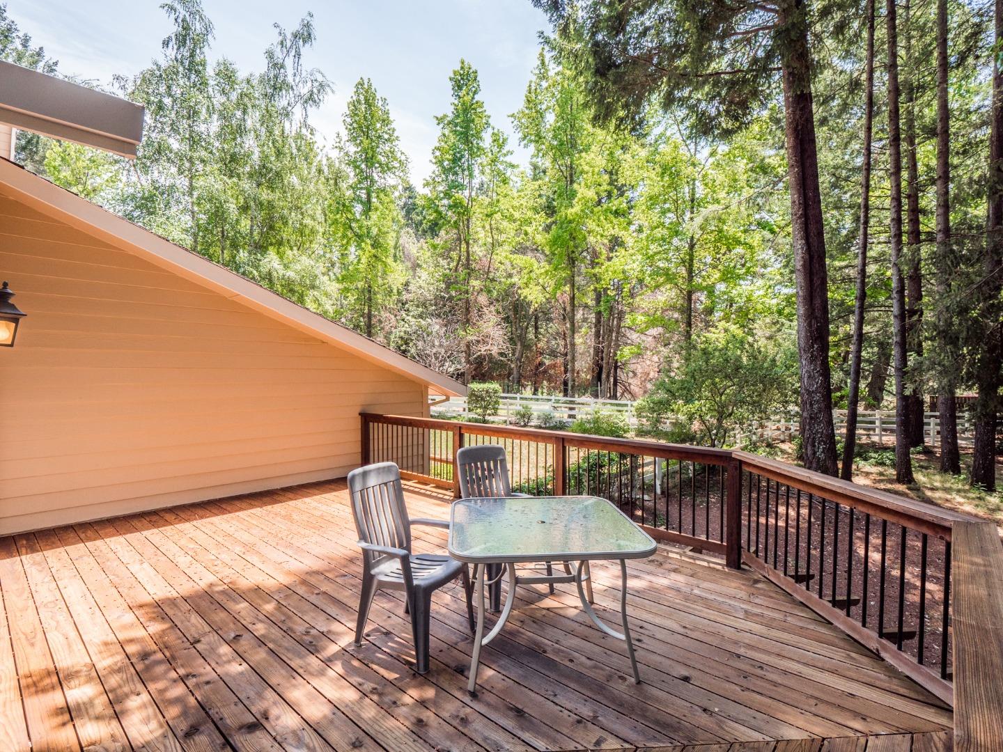 12445 Alba Road Ben Lomond, CA 95005 - Photo 18 of 37 a view of balcony with wooden floor and outdoor seating