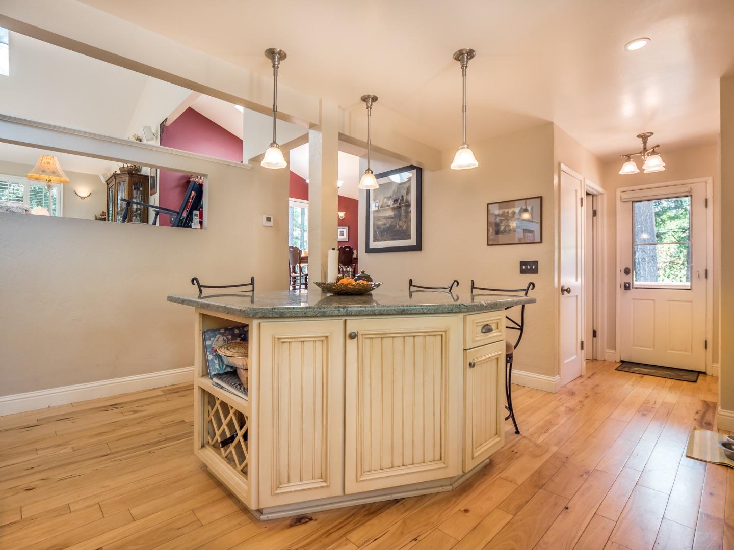 12445 Alba Road Ben Lomond, CA 95005 - Photo 27 of 37 a kitchen with stainless steel appliances granite countertop a stove a sink and a wooden floor