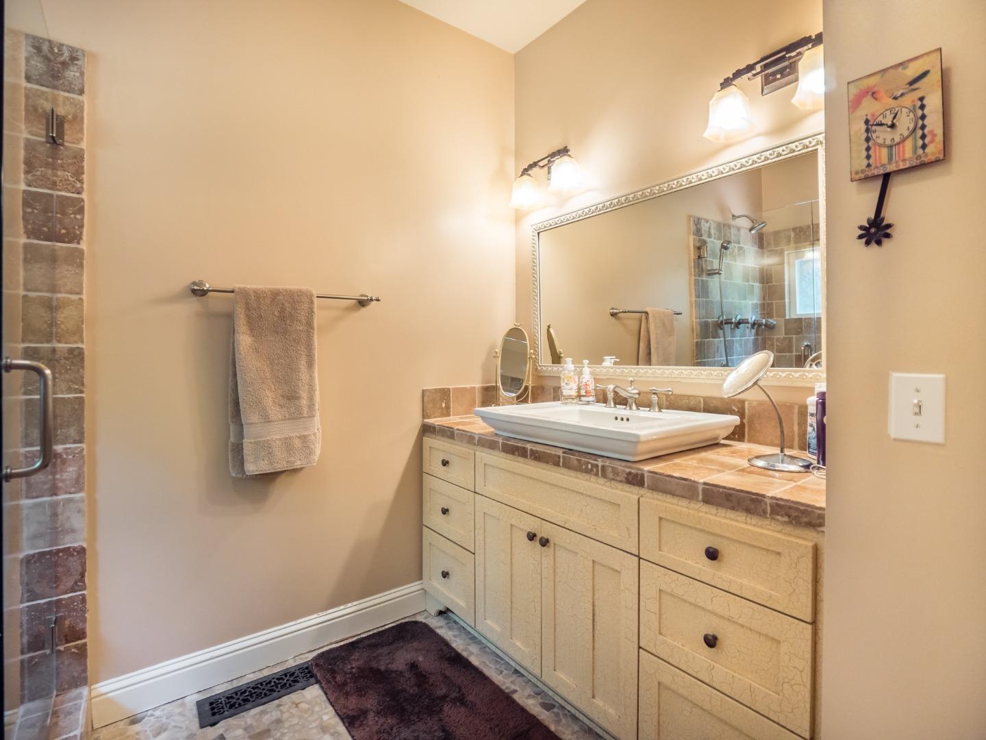 12445 Alba Road Ben Lomond, CA 95005 - Photo 30 of 37 a bathroom with a sink and a mirror