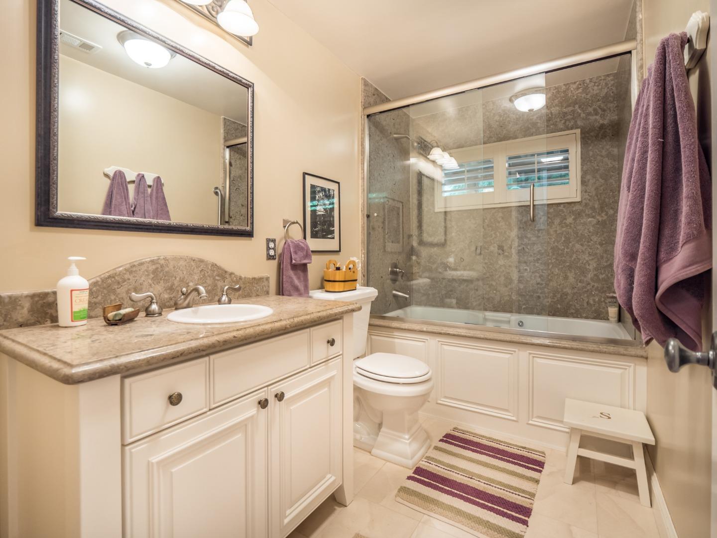 12445 Alba Road Ben Lomond, CA 95005 - Photo 33 of 37 a bathroom with a granite countertop sink toilet and shower