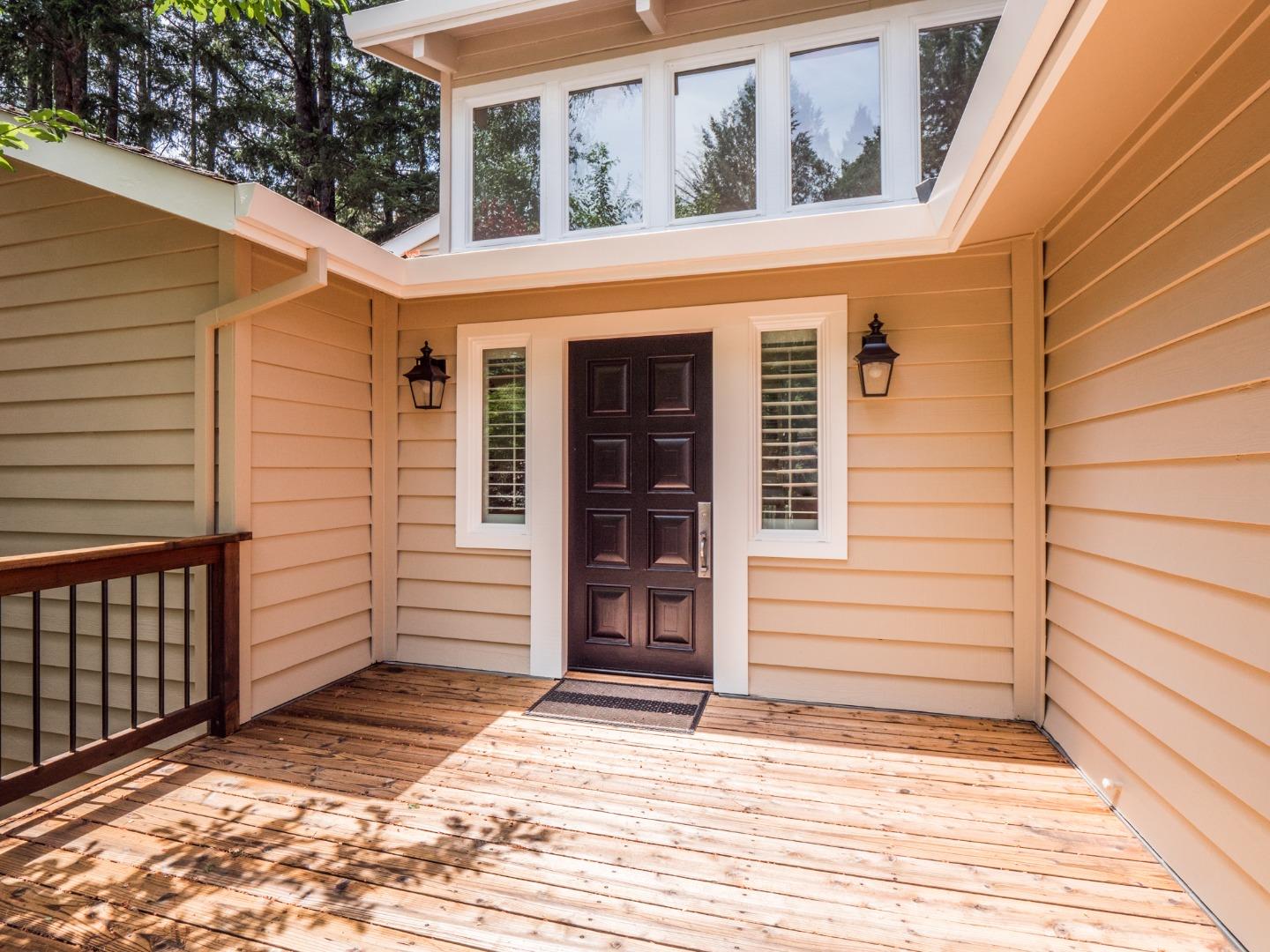 12445 Alba Road Ben Lomond, CA 95005 - Photo 4 of 37 a view of a house with a door and wooden walls