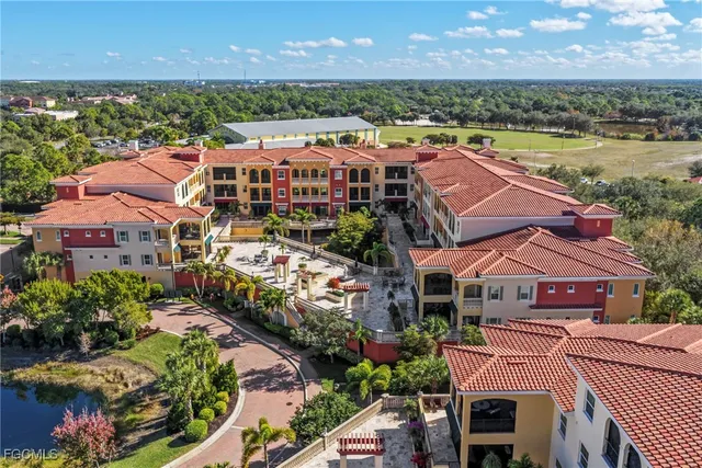 front view of a building with a swimming pool