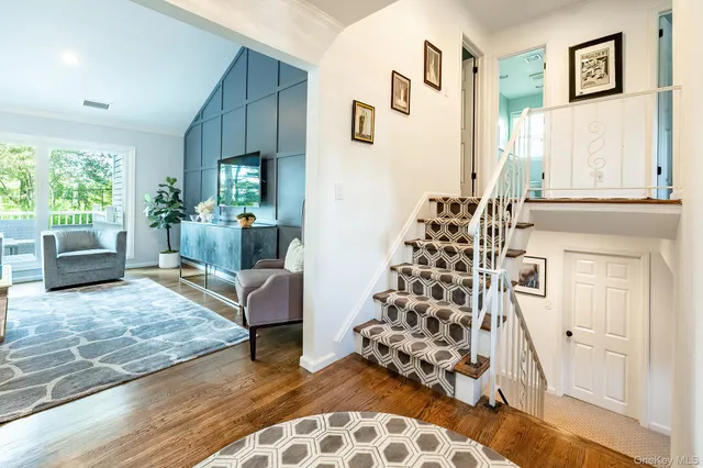 a living room with furniture and window