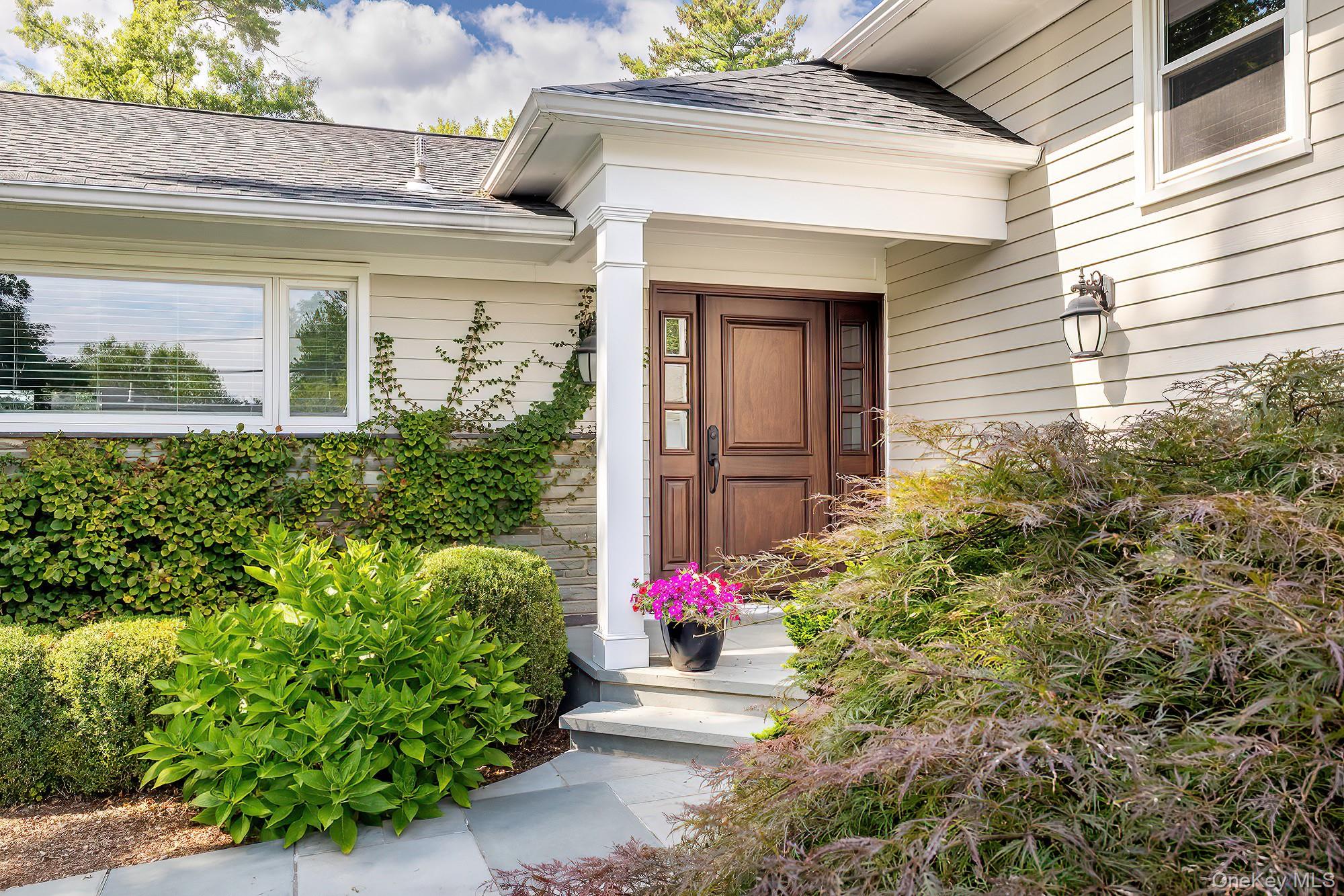 53 Country Ridge Drive Rye Brook, NY 10573 - Photo 3 of 50 a view of a potted plants in front of a house