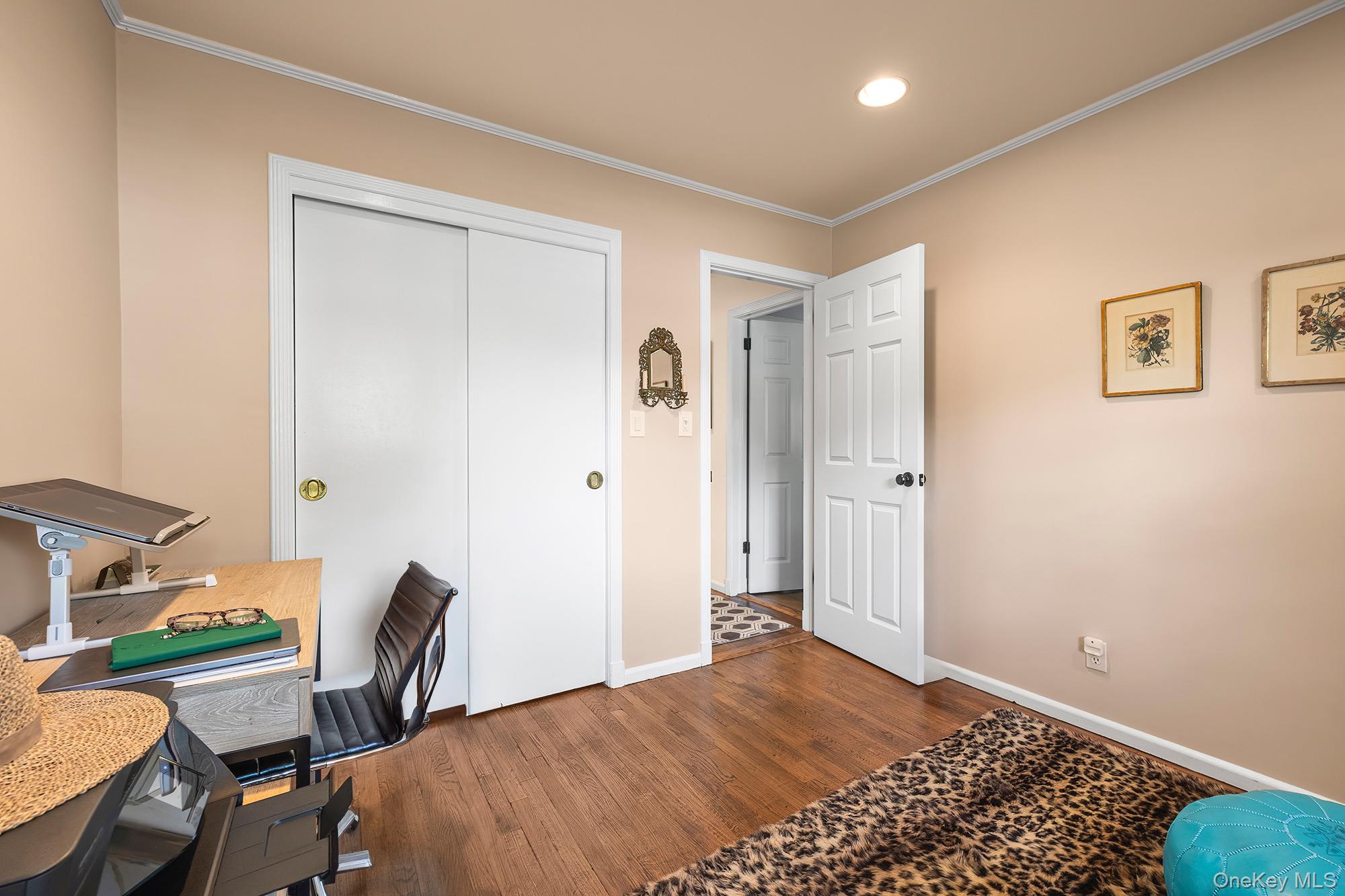 53 Country Ridge Drive Rye Brook, NY 10573 - Photo 31 of 50 a bedroom with a bed and a desk