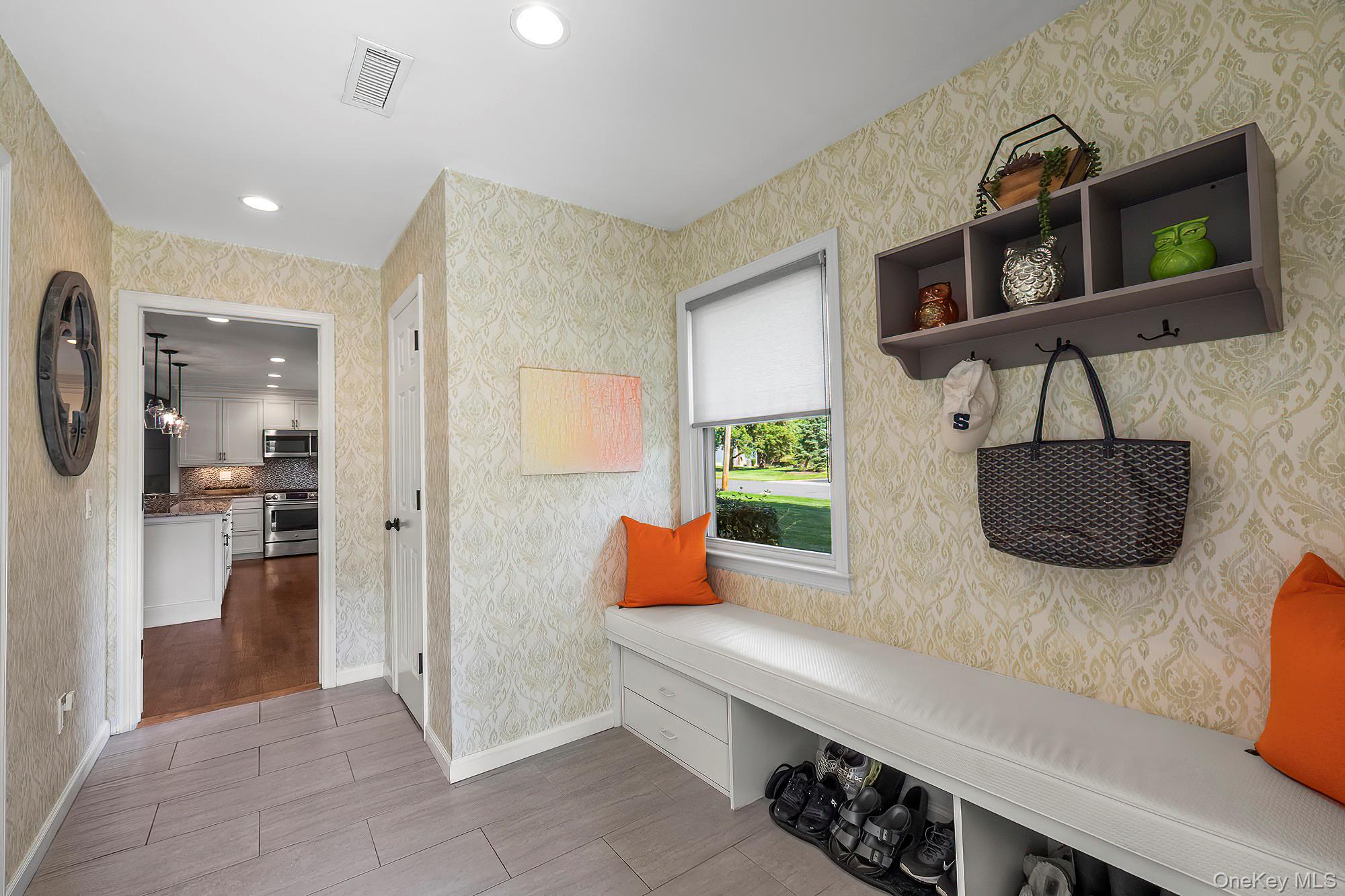 53 Country Ridge Drive Rye Brook, NY 10573 - Photo 34 of 50 a kitchen with stainless steel appliances granite countertop a refrigerator and a stove